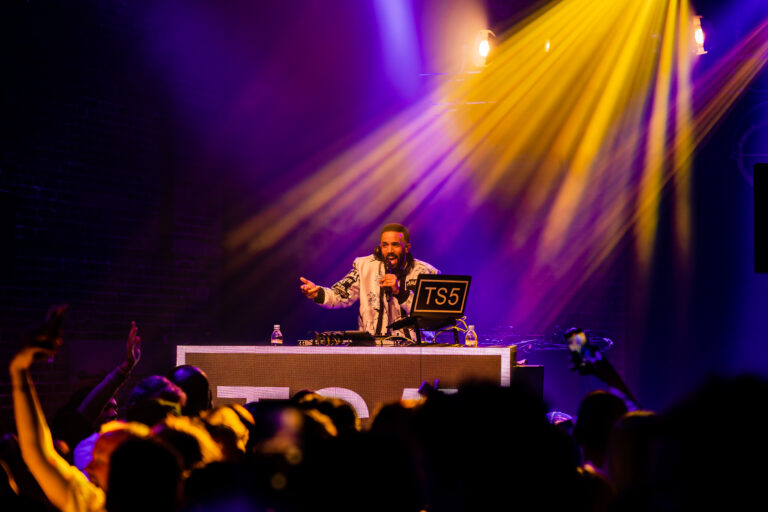 Craig David DJing behind custom videowall DJ booth