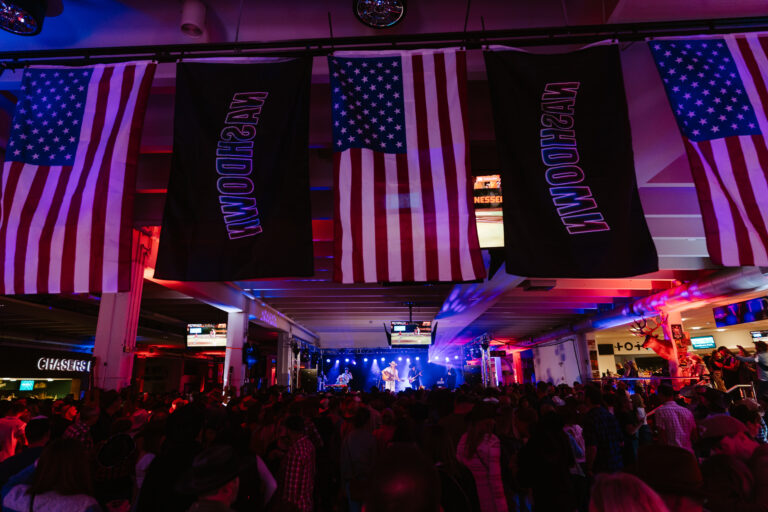 Flags with stage in background