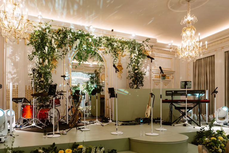 Custom built sage green stage with LED strips with full live band set up