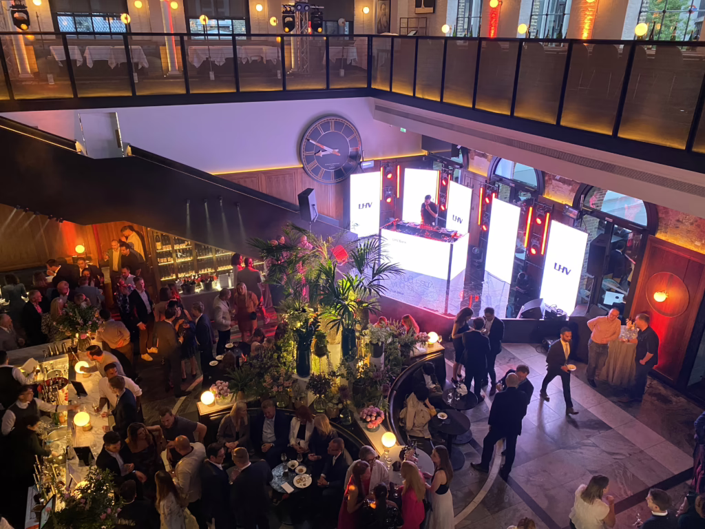 DJ Sigala mixing on Pioneer DJ Equipment in front of an LED video wall display