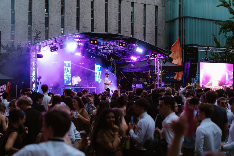 Imperial College Summer Ball 2025 main stage with video walls and dynamic lighting