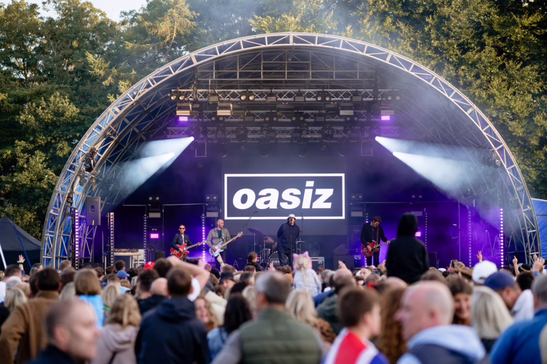 Main stage with Oasis tribute act graphics
